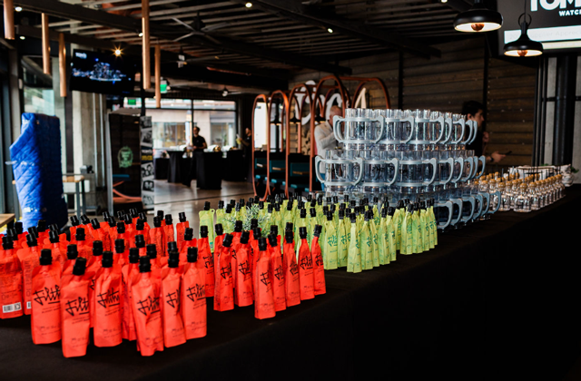 branded drinks on a welcome table for a conference event