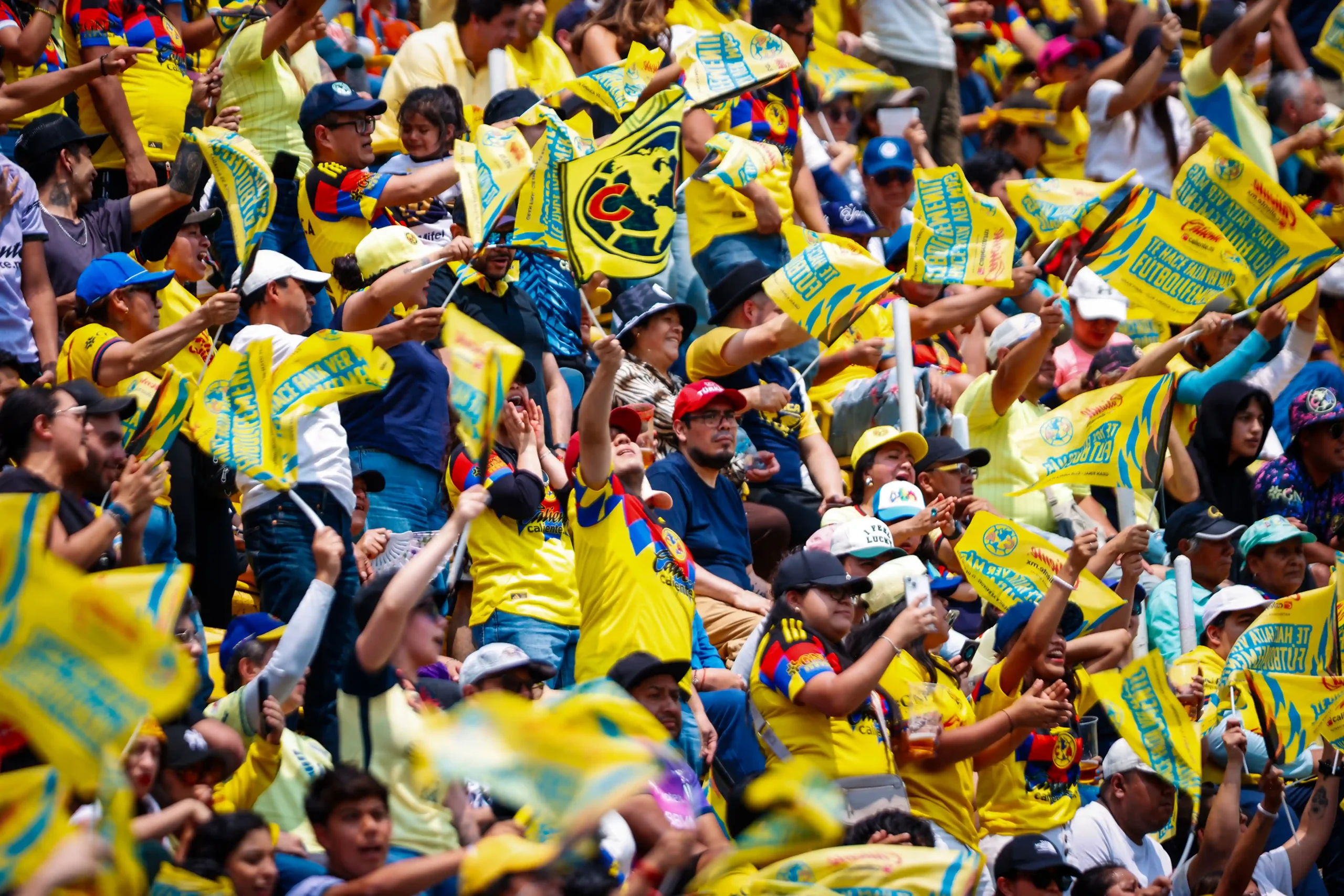 Club America fans, cheering at the stadium.