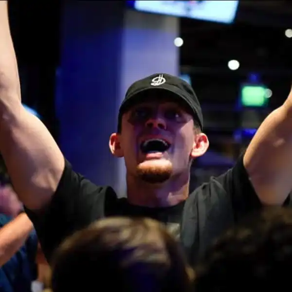 Fan cheering watch party